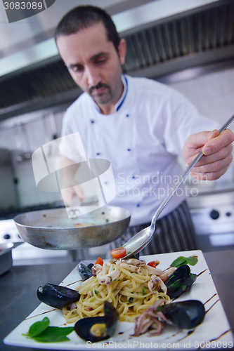 Image of chef preparing food