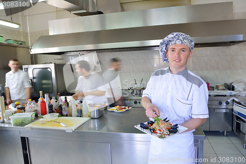 Image of chef preparing food