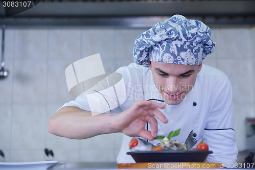 Image of chef preparing food