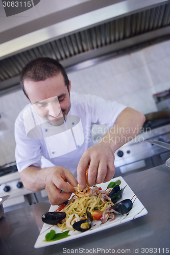 Image of chef preparing food