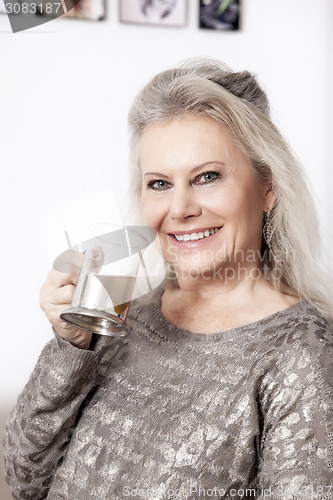 Image of woman and tea