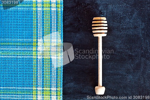 Image of honey stick and tablecloth