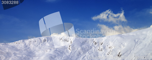 Image of Panoramic view on off-piste slope in early morning