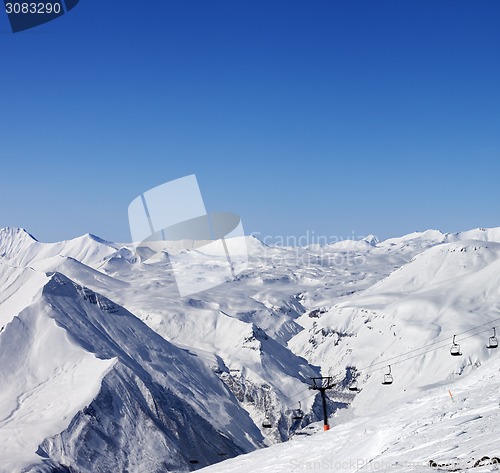 Image of Ski resort at sun winter day