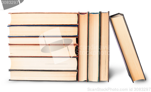 Image of Vertical and horizontal stacks of old books