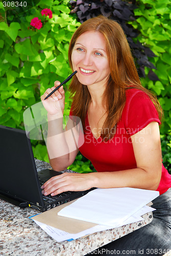 Image of Woman working at home