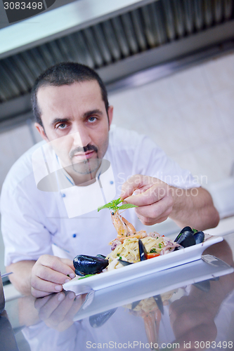 Image of chef preparing food