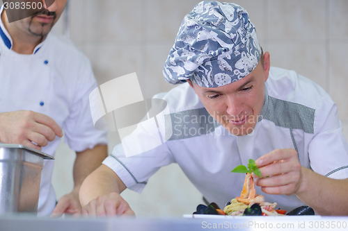 Image of chef preparing food