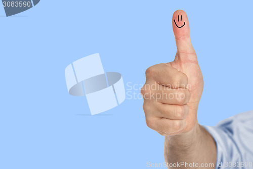 Image of Thumb up with a smile