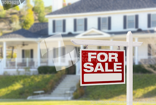 Image of Home For Sale Sign in Front of New House