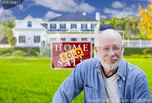 Image of Senior Adult Man in Front of Real Estate Sign, House