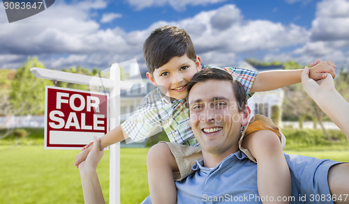 Image of Mixed Race Father, Son Piggyback, Front of House, Sale Sign