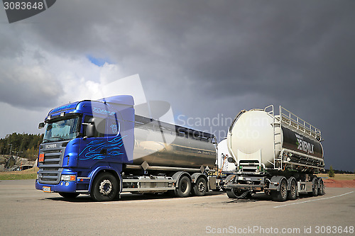 Image of Scania R480 Tank Truck and a Trailer on a Yard