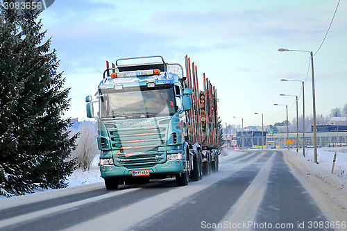 Image of Scania R500 Logging Truck on the Road with Full Log Load