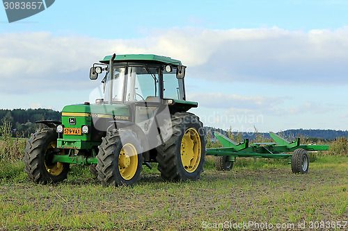 Image of John Deere 2850 Utility Tractor and Small Trailer