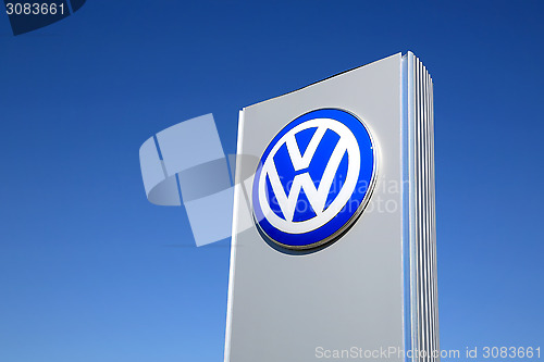 Image of Sign Volkswagen against Blue Sky