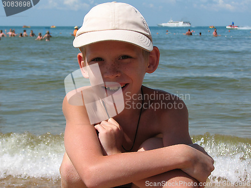 Image of Portrait of the Russian boy on the sea coast.