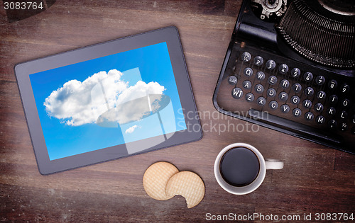 Image of Cloud-computing connection on a digital tablet pc