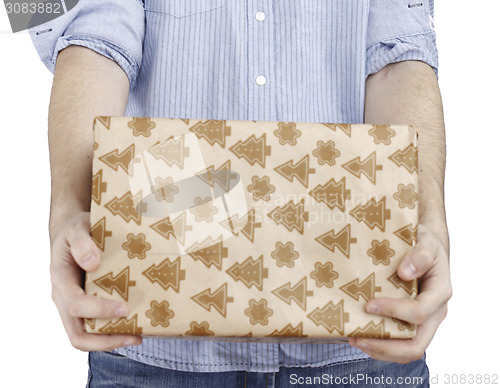 Image of Young man holding a present