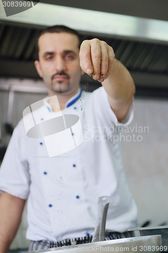 Image of chef preparing food