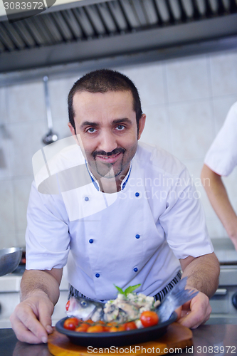 Image of chef preparing food