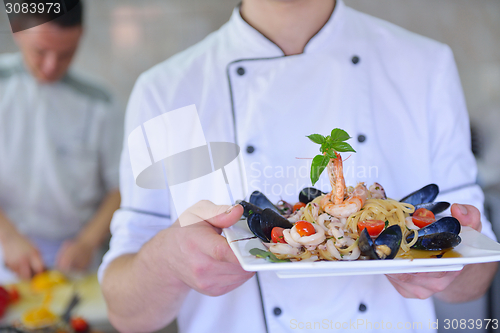 Image of chef preparing food