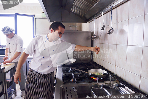 Image of chef preparing food