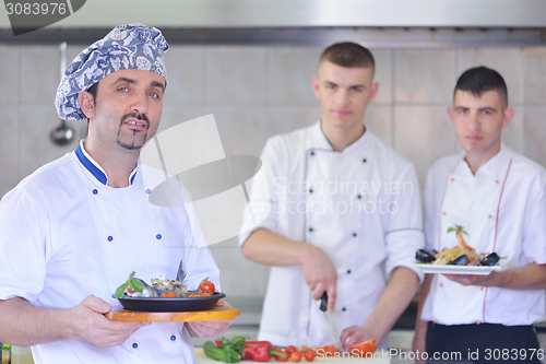 Image of chef preparing food