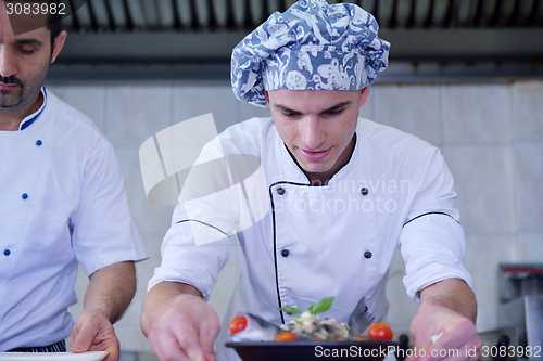 Image of chef preparing food