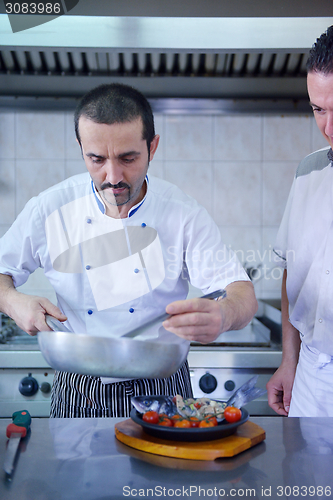 Image of chef preparing food