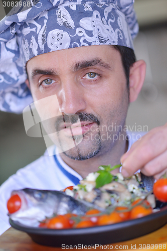 Image of chef preparing food