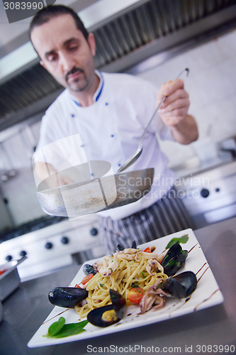 Image of chef preparing food