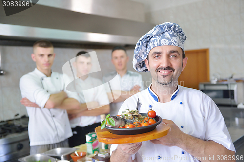 Image of chef preparing food