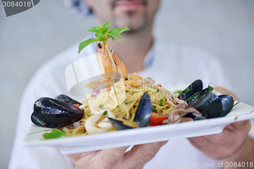 Image of chef preparing food