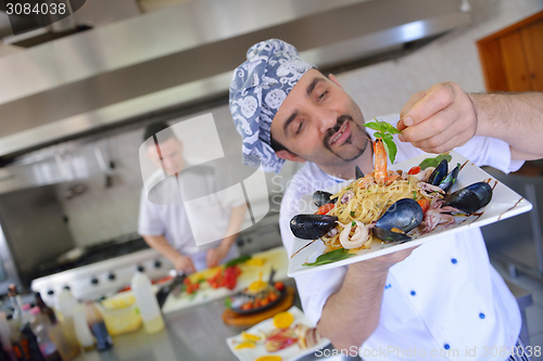 Image of chef preparing food