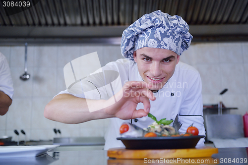 Image of chef preparing food