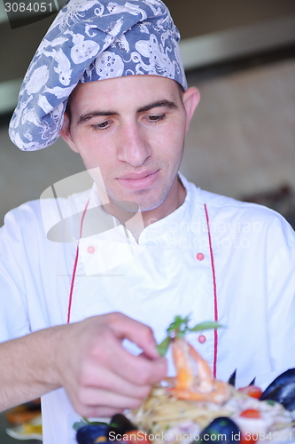 Image of chef preparing food