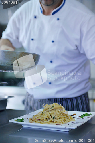 Image of chef preparing food