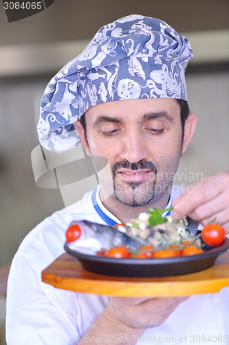 Image of chef preparing food