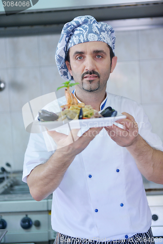 Image of chef preparing food