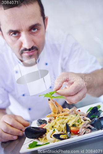 Image of chef preparing food