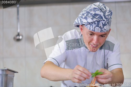 Image of chef preparing food