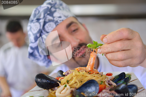 Image of chef preparing food