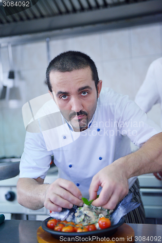 Image of chef preparing food