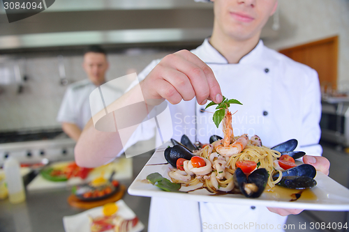 Image of chef preparing food