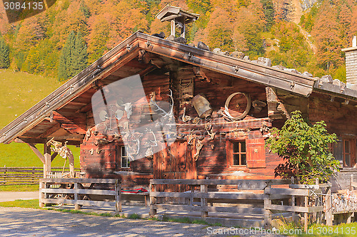 Image of Hut in the village center on maple back