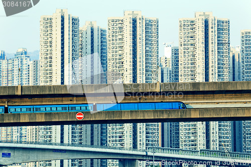 Image of sky train and track system in a modern neighborhood