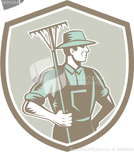 Image of Organic Farmer Rake Shield Woodcut Retro