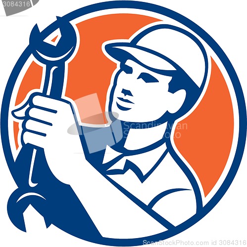 Image of Mechanic Holding Spanner Wrench Circle Retro