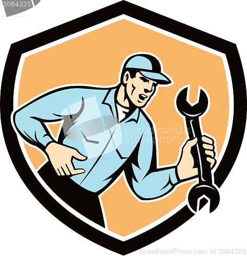 Image of Mechanic Shouting Holding Spanner Wrench Shield Retro